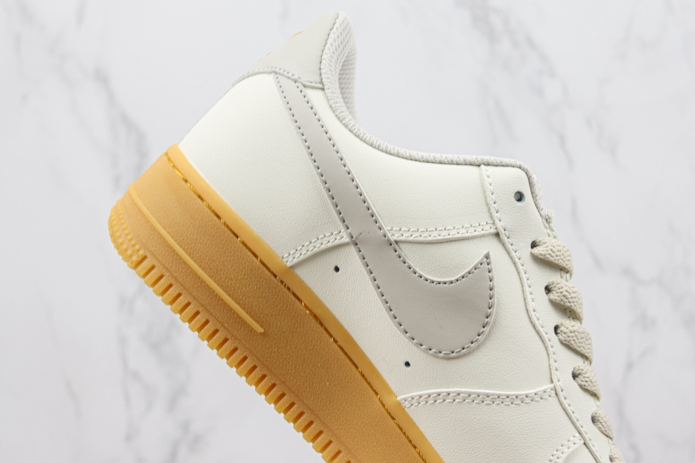 Nike Air Force 1 07 Low Light Grey Gum Gold XC2351-066 - Shop Now for a Sleek and Stylish Sneaker! Nike Air Force 1 07 Low Light Grey Gum Gold XC2351-066 - Shop Now for a Sleek and Stylish Sneaker!